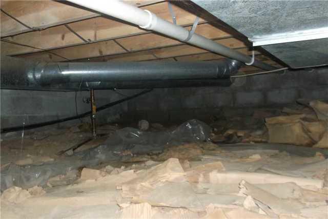 Debris in Wet Crawl Space
