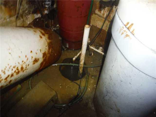 Inefficient Drain System in Moldy Basement