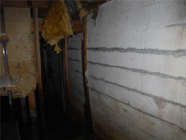 Badly Bowing Wall in Charlotte, MI Basement