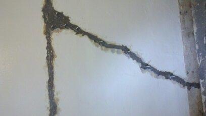 <p>2nd crack spanning widith and partial length of wall.&nbsp; Had to inject with structural epoxy due to settlement issues</p>