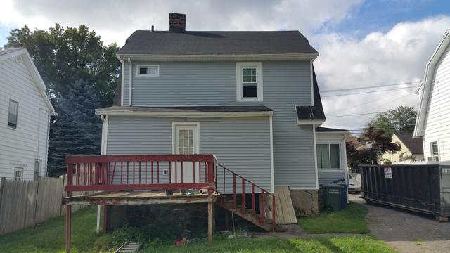 The back of the roof was showing signs of older shingles and a roof that needed to be replaced.