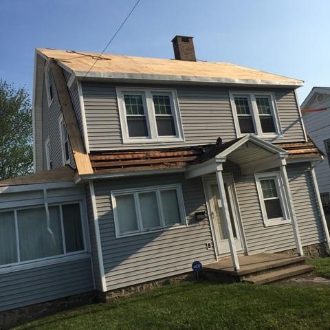 We had to completely strip the roof in order to get the job started. Once it was stripped, we were able to begin the new roofing