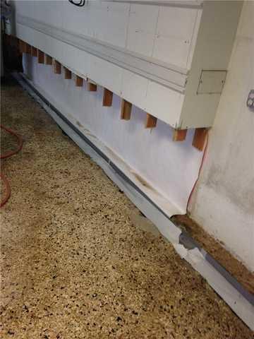 <p>Quality 1st Basement Systems removed the bottom portion of the basement walls in preparation for restoration.</p>