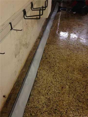 <p>The installation team installed an internal drain to remove moisture from the basement.</p>