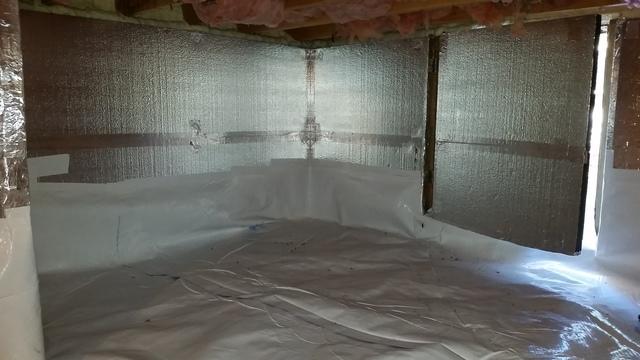 <p>This photo shows what a crawl space should look like after a professional installation. The CleanSpace vapor barrier is laid on top of the drainage matting and is fixed to the newly insulated walls in order to effectively keep moisture out of this space.</p>