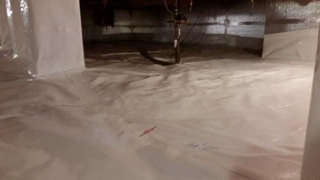 <p>The floors in the crawl space after encapsulation are very smooth and free of any dirt or moisture. This is a much more pleasant crawl space than it was before we came in to do the work.</p>