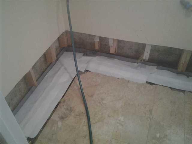 <p>The internal basement drain will catch moisture and drain it to the sump pump.</p>