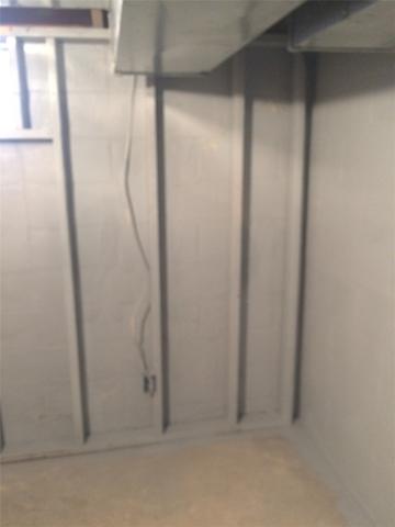 Water Damage from Wall Leak in Basement