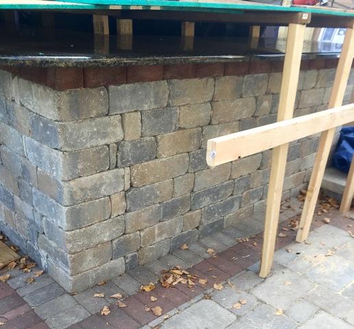 We built a fortress over the outdoor kitchen to protect the Granite counter top and stainless steel sink