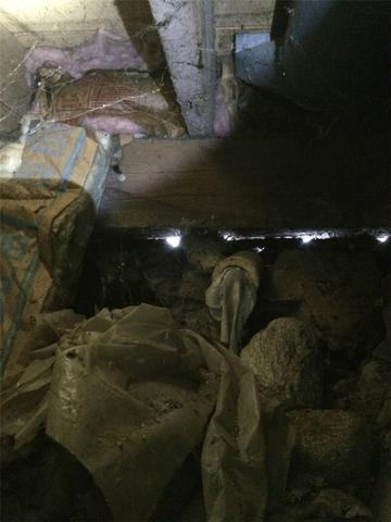 Failing Cobblestone Wall in Coopersville, MI Crawl Space