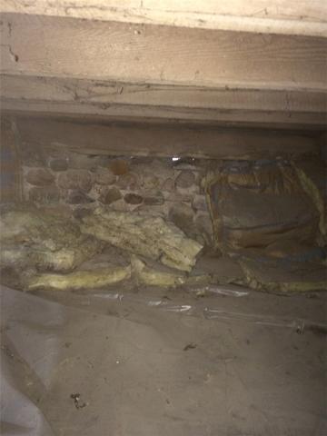 Wide Shot of Failing Wall and Inefficient Insulation