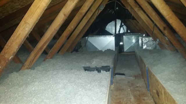 <p>Photo shows an attic cat walk with insulation retaining dams. The purpose is to allow safe access to mechanical systems in the attic, for future service needs. This is part of our standard job when properly air sealing and insulating. This attic was insulated with cellulose insulation to R-60. &nbsp;&nbsp;</p>