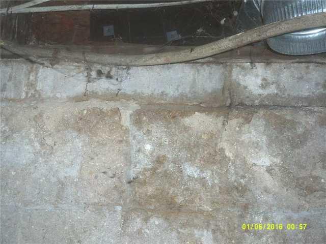 Efflorescence and Water Damage on Crawl Space Walls