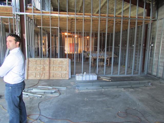 General Manager Bob Cherry overlooking work getting done at the new building