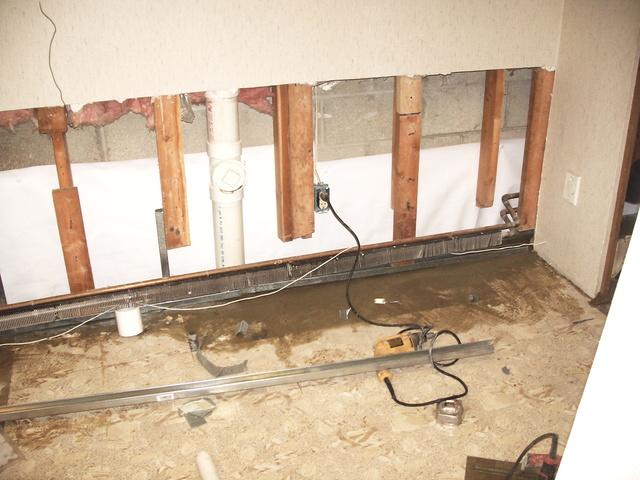 Process of wall removal continues so we are putting our paneling up.