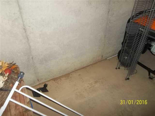 Water Damage on Basement Walls and Floor