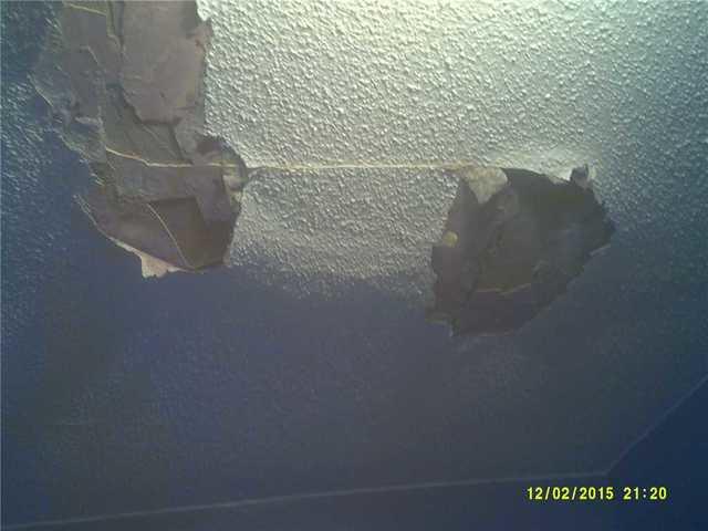 Water Damage on Ceiling from Leaking Roof