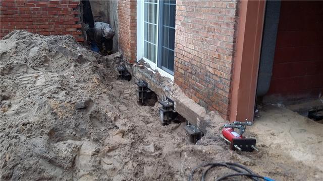 The piers are placed strategically to bear the weight of the house rather than relying on the proven unreliable soil, which has already shifted and caused the foundation to settle. Since the piers are drilled deep into the ground, they will support the home regardless of what happens in those first few feet of soil.