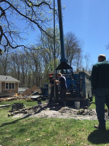 <p>Beginning work on the well.</p>