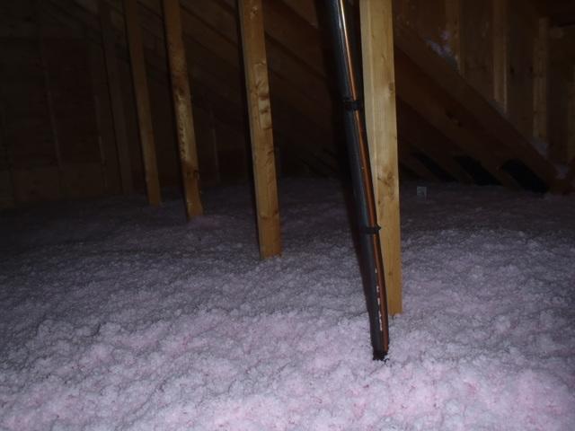 <p>One of the advantages of blown fiberglass insulation as opposed to fiberglass batts is that it allows for more complete coverage of the surface. As you can see in this picture, there are no gaps left and this attic floor is completely covered with insulation. Call Dr. Energy Saver if you need an insulation update.</p>