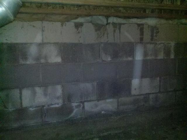 Masonry wall in crawlspace before sealing in Billings, MT