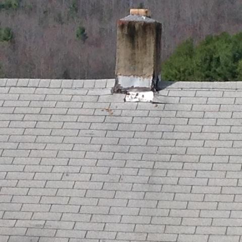 This roof's flashing and sealant was crumbling and allowing water to leak into the home.