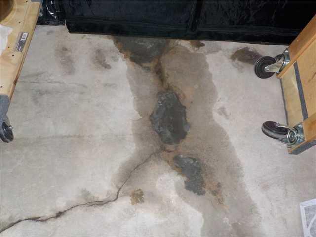 DIY Crack Repair Fails to Waterproof Evart Home