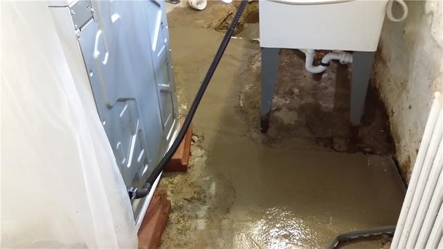 After installing the WaterGuard system, we pour new concrete to restore the floor.