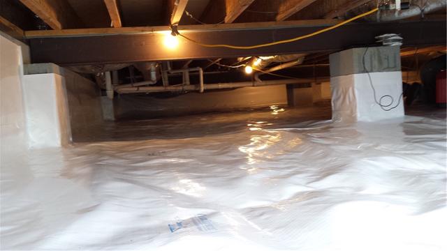 This homeowner has the best vapor barrier in America. Designed to never rip and comes with a warranty. It is your best protection against moisture in your crawl space!