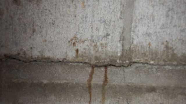 Water Leaking from Bowed Wall Crack