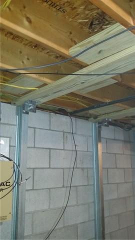 Joist Reinforcements Help Support Weight of House