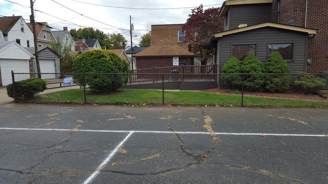 This is another photo of the completed brown chain link fence.