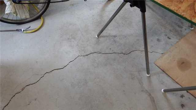 Cracked Basement Floor Causes Wall Issues
