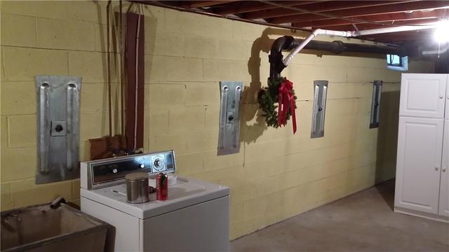 Pulling out to a wider shot shows how wide this wall is, and how big of a problem the bowing has created. We installed anchors around the entire perimeter of the basement to stop and counteract the bowing.