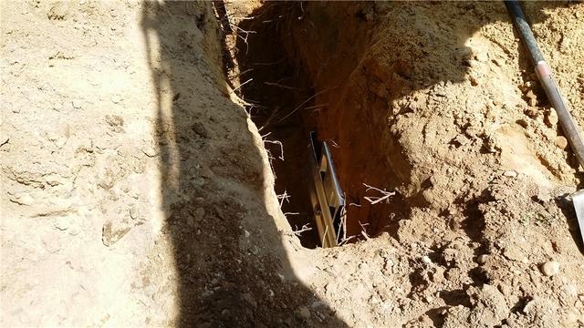 By securing the anchors in virgin soil, we can provide stability to the walls and prevent further bowing. We can also tighten the system over time to hopefully straighten the walls.