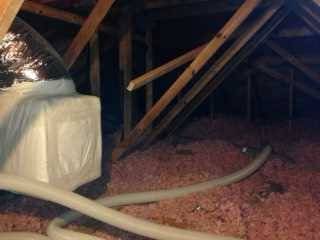 The old fiberglass insulation