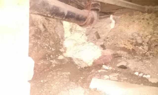 Attempts at Filling Cracks in Crawl Space