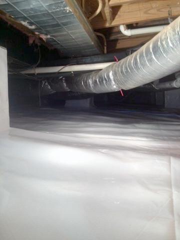 <p>Here you can see how the CleanSpace liner creates a pristine area out of what was once a filthy crawlspace.</p>