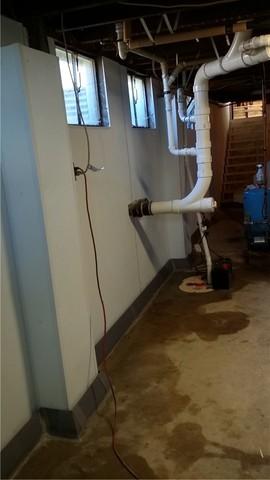 New Sump Pump Proactively Removes Water from Basement
