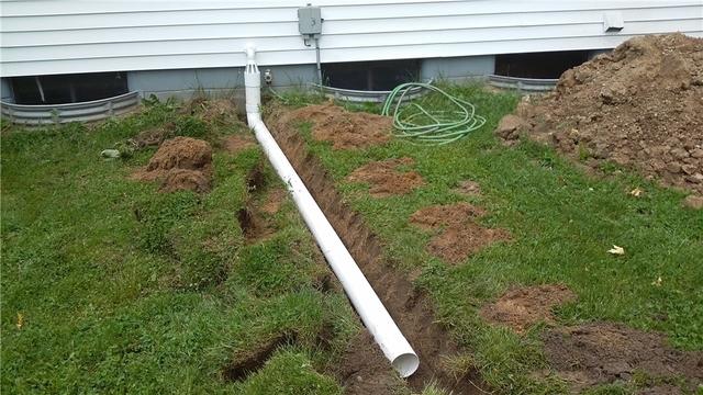 Discharge Lines Direct Water Away from House