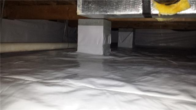 In this picture, the crawl space has been completed with wall liners.