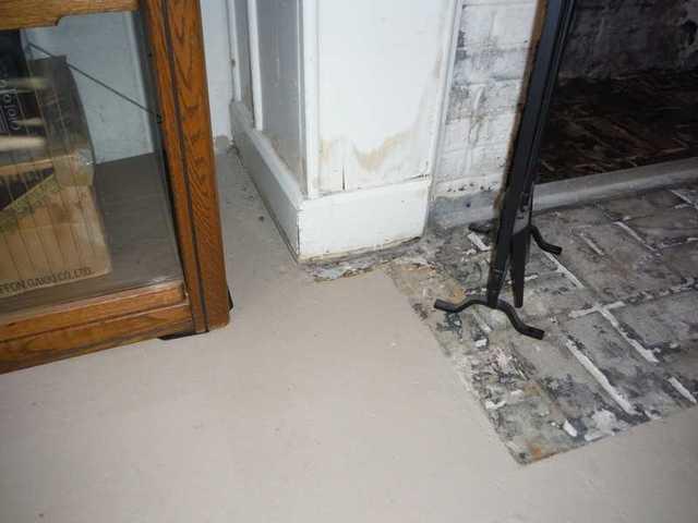 Water damage is a major concern in this basement. On the frame next to the fire place there are water damage stains that prove water is an issue in this basement. DryZone came to repair this unwanted water damage.