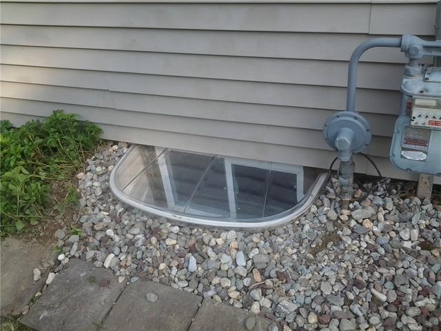 Basement Window Well in Ocean