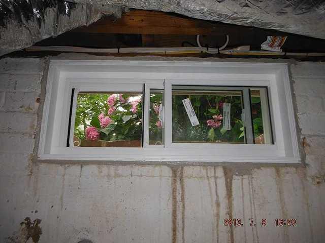 <p>The Everlast basement window you see here, installed in this Maryland home, is made of heavy, double-pane glass. The frame is vinyl so that is won't rust like the old window frame. The entire window is sealed with caulk. Before any of that happens, one of DryZone's inspectors actually measures each window individually so they fit like a glove.</p>