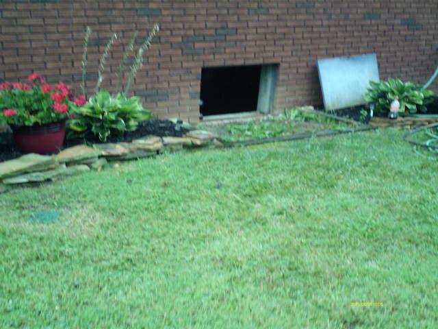 Installing the new crawl space door!