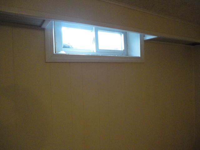 <p>This is a perfect window to maximize the amount of sunlight coming into the dark basement. This photo is from a home in Niantic.</p>