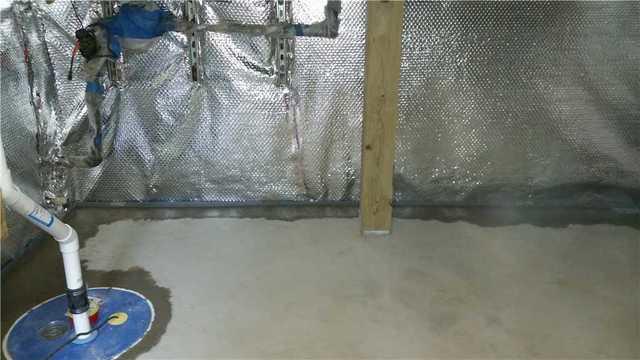 DryZone installed the SuperSump Pump in the basement to control the flow of water.