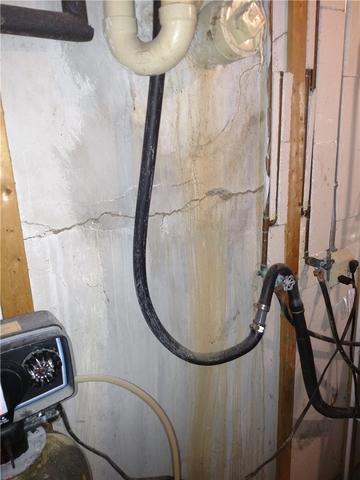 Leaking Crack in Bowing Basement Wall