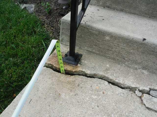 Deep Cracks In Concrete Stairs