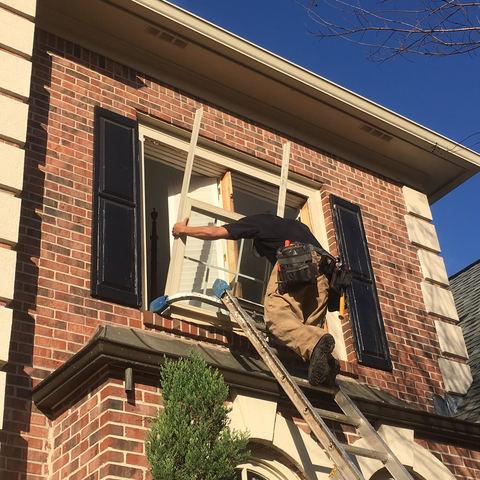 Here's a close up of our installer Jeremy removing the old windows.